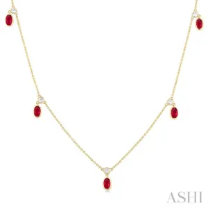 5x3 MM Oval Shape Ruby and 1/8 ctw Round Cut Diamonds Precious Station Necklace in 10K Yellow Gold